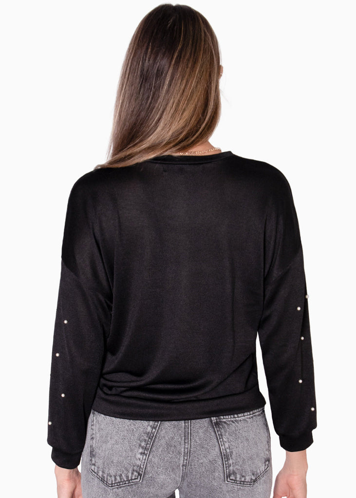 Buzo manga larga con perlas en mangas color negro para mujer - Flashy