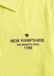Camiseta tipo polo cropped con perilla, cuello y bordado - GERBERA.AMARILLO