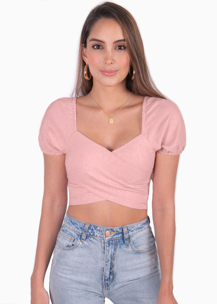 Crop top con escote cruzado y mangas embombadas color rosado para mujer - Flashy