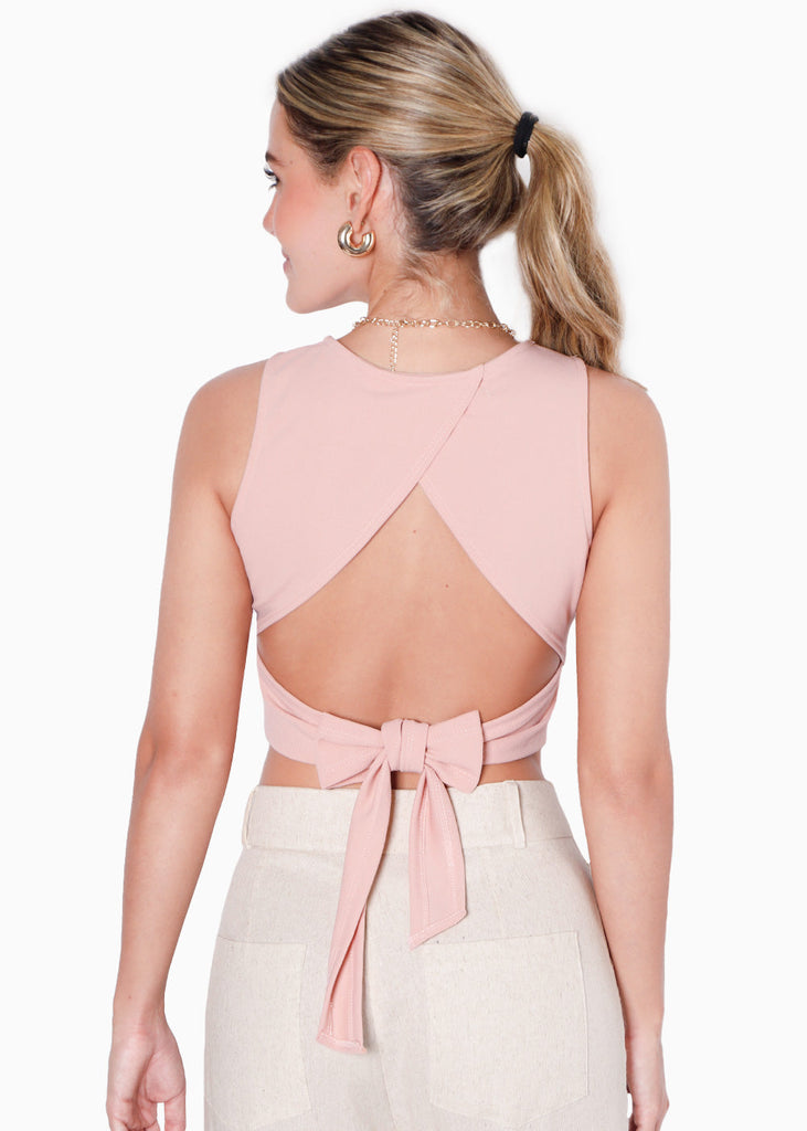 Crop top sin mangas con espalda descubierta y anudado color rosado para mujer - Flashy