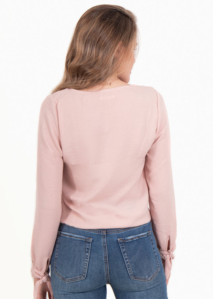 Blusa cruzada rosada con moños en mangas para mujer - Flashy