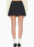 Falda corta con prenses - OCHUVA.NEGRO