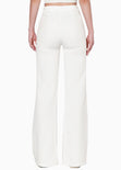 Pantalón flare de tiro alto con cortes color blanco, marfil para mujer - Flashy